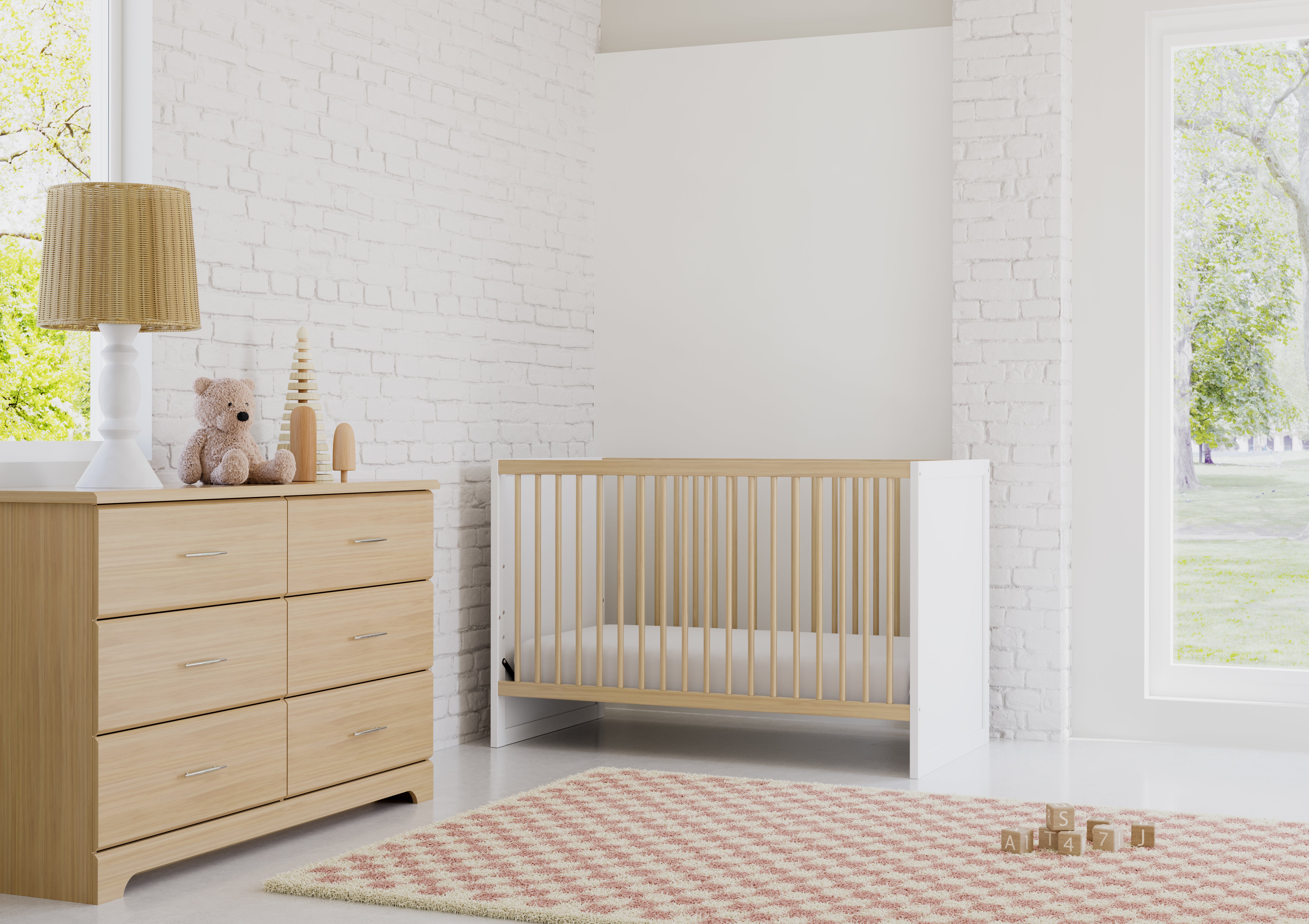 White with driftwood finishes crib, and driftwood 6-drawer dresser in a beautifully furnished room