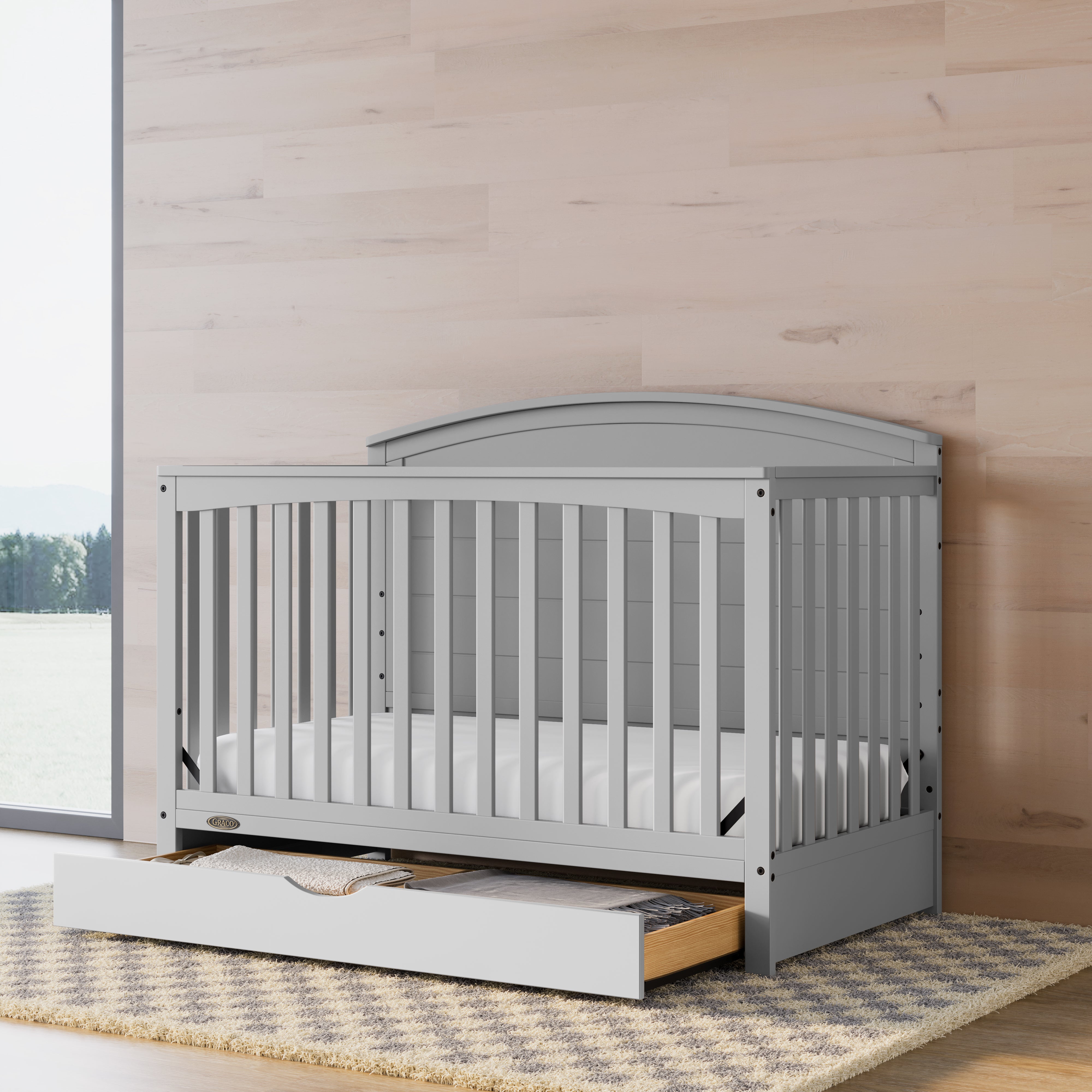 Graco® Bellwood® 5-in-1 Convertible Crib with Drawer.