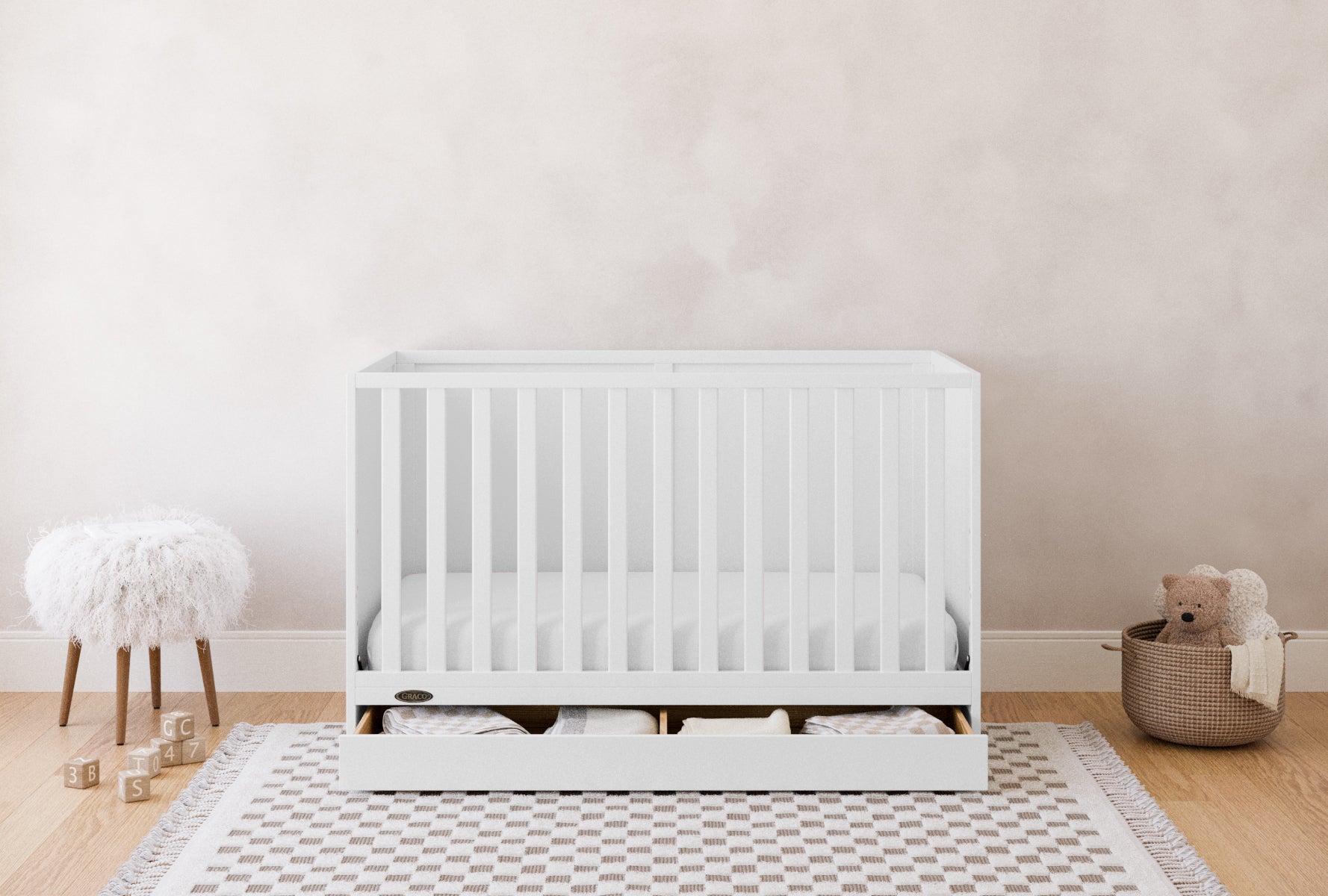 Graco® Theo 3-in-1 Convertible Crib with Drawer.