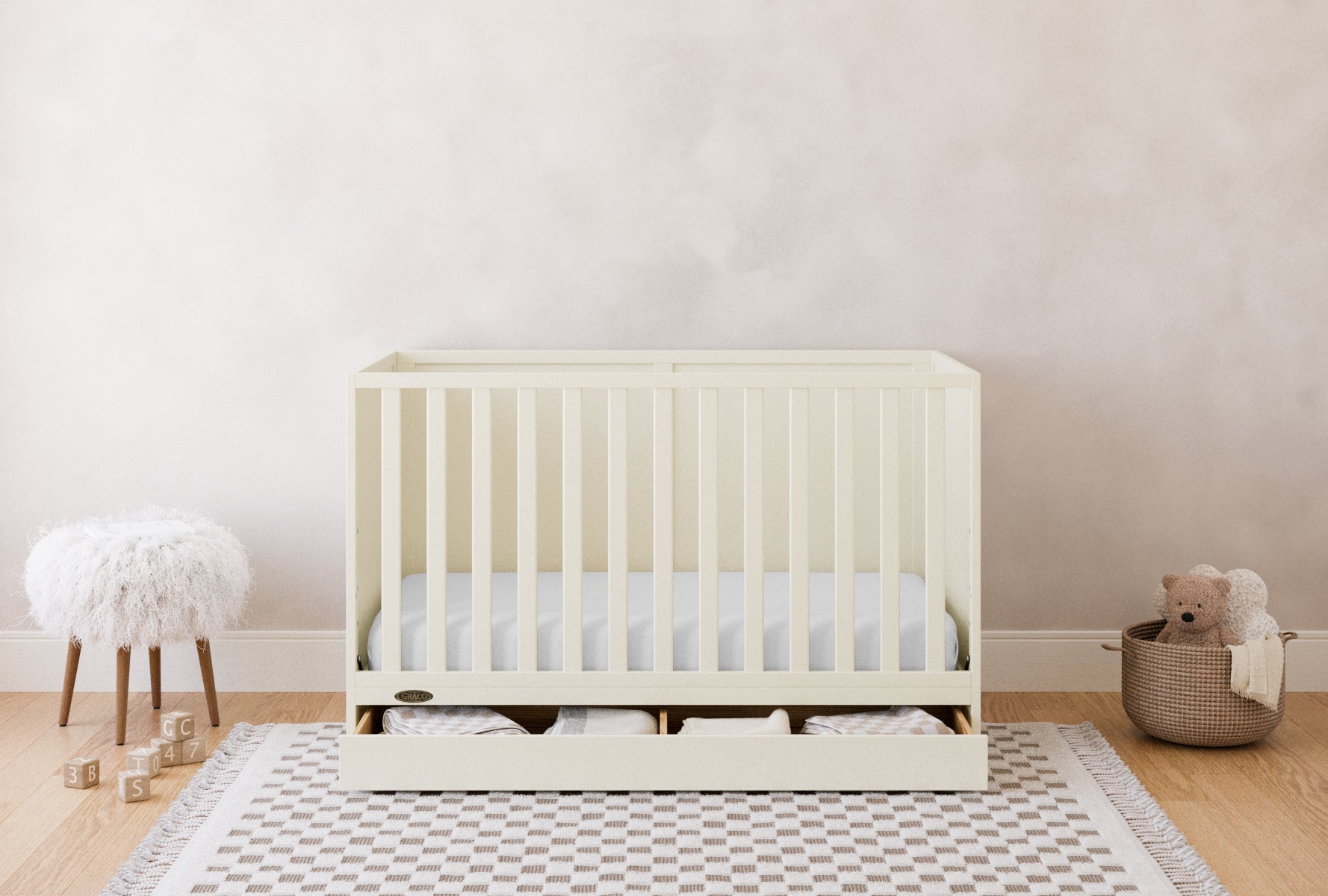 Graco® Theo 3-in-1 Convertible Crib with Drawer.