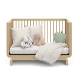 Storkcraft® Santorini® Deluxe 5-in-1 Convertible Crib with Bonus Toddler Guardrail.