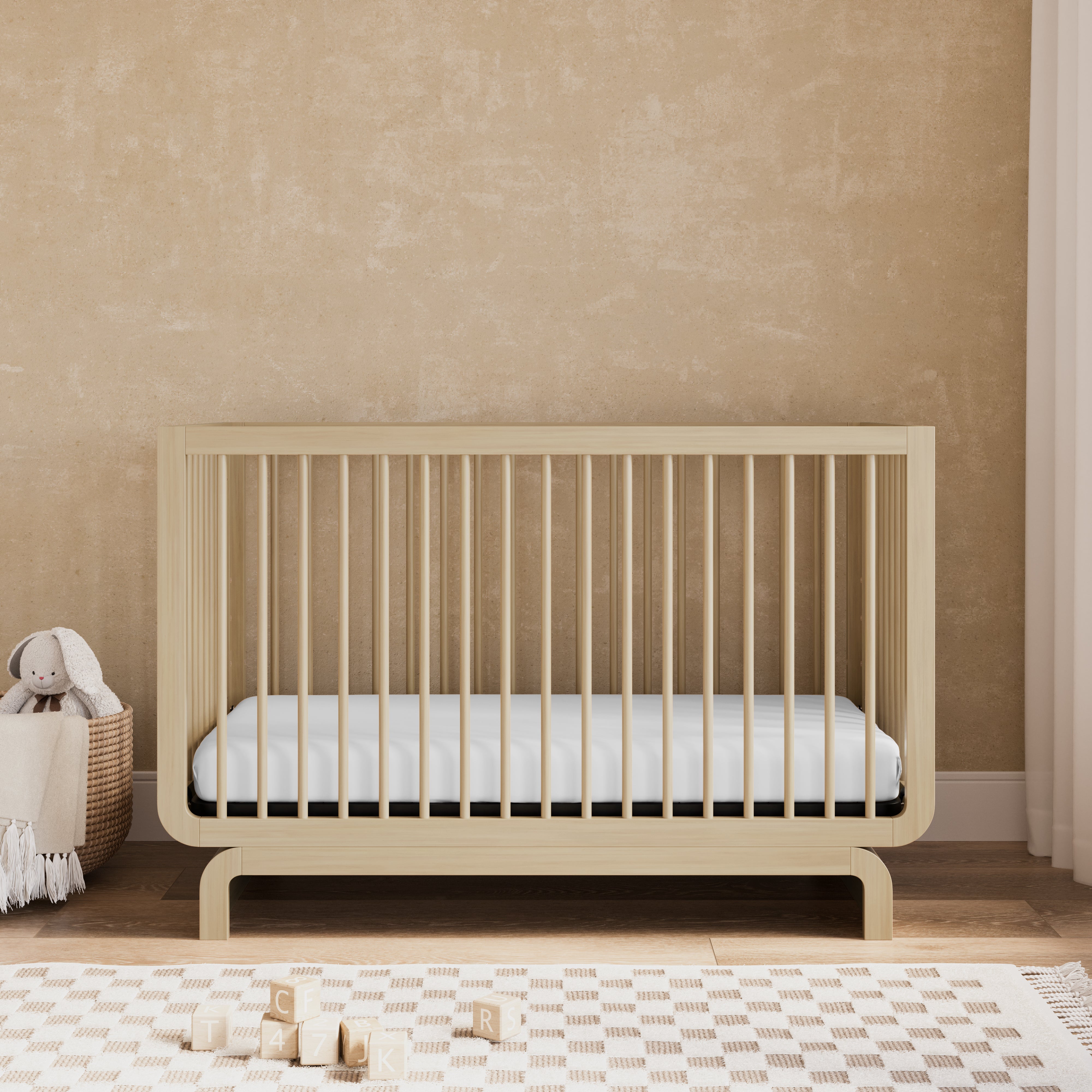 Storkcraft® Santorini® Deluxe 5-in-1 Convertible Crib with Bonus Toddler Guardrail.