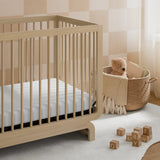 Storkcraft® Santorini® Deluxe 5-in-1 Convertible Crib with Bonus Toddler Guardrail.