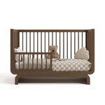 santorini hazelnut crib toddler bed conversion with bedding and teddy bear