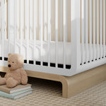 Storkcraft® Santorini® Deluxe 5-in-1 Convertible Crib with Bonus Toddler Guardrail.