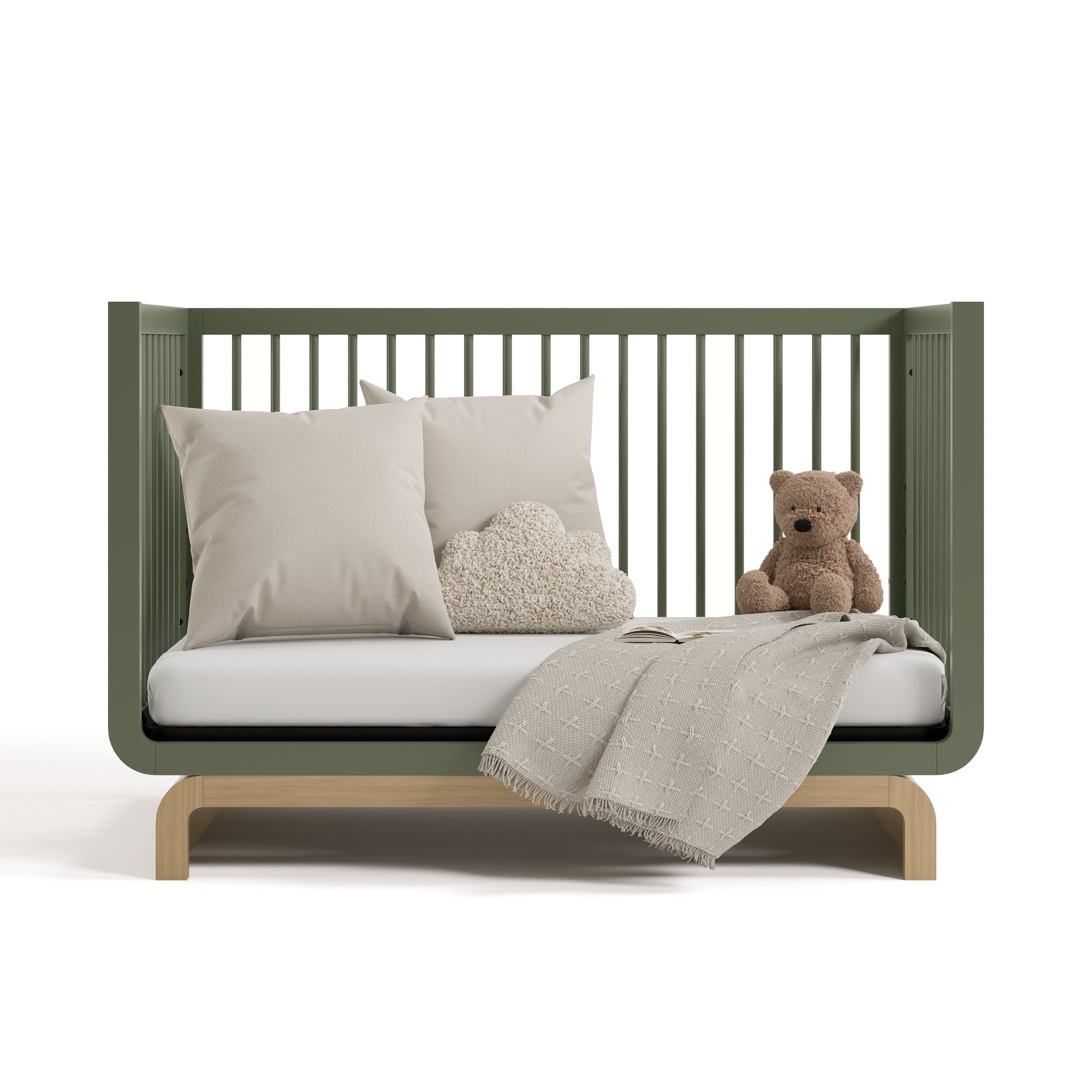 santorini olive with driftwood crib daybed conversion with blanket, pillows, and teddy bear