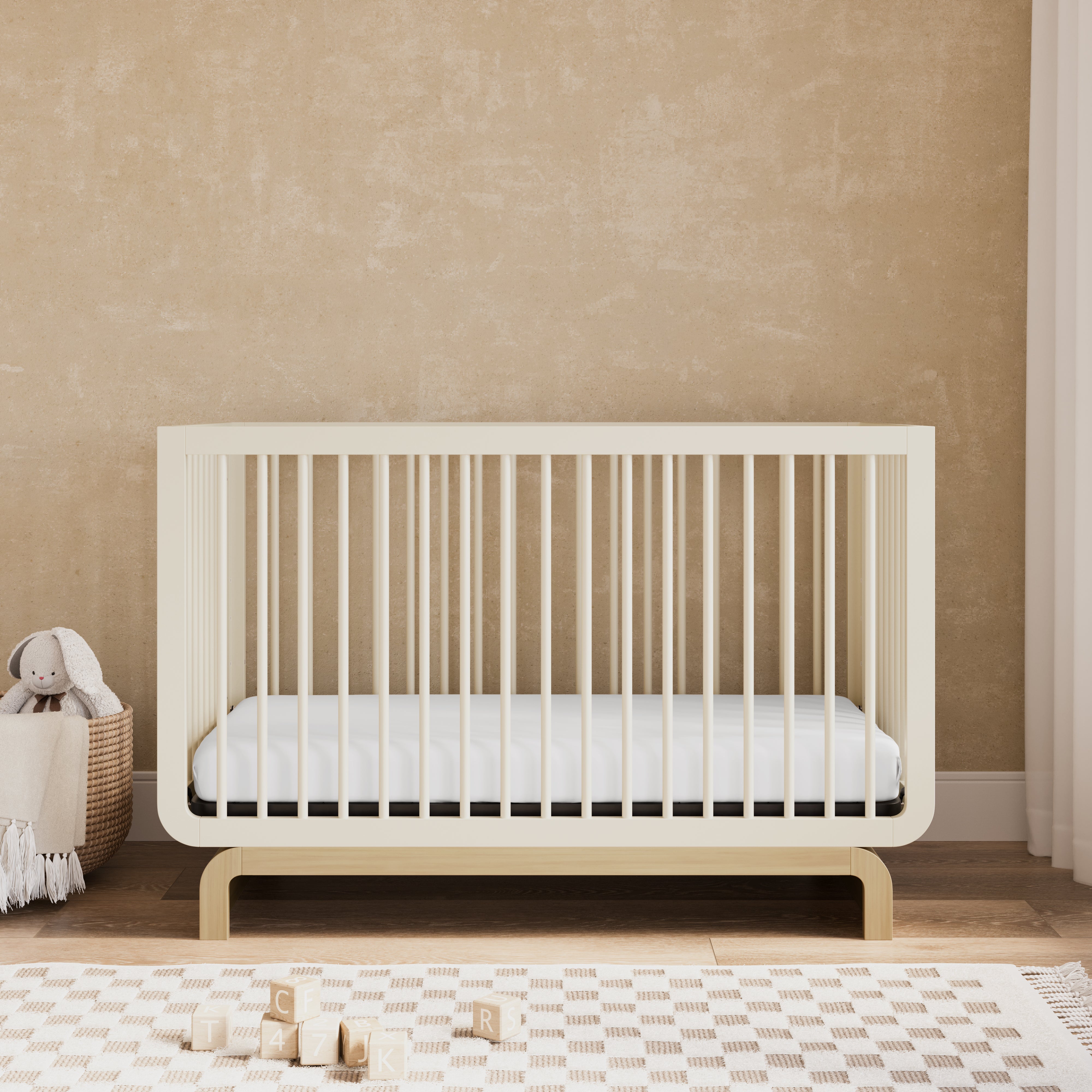 Convertible crib in frosted oat with driftwood colorway in a nursery (Frosted Oat with Driftwood)