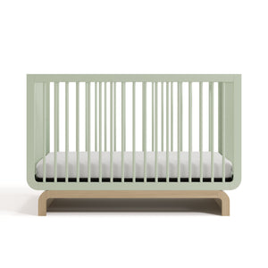 Two-tone sage and natural wood baby crib, at a front-facing angle (Sage with Driftwood)