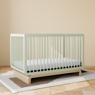 Convertible crib in sage with driftwood colorway in a nursery (Sage with Driftwood)