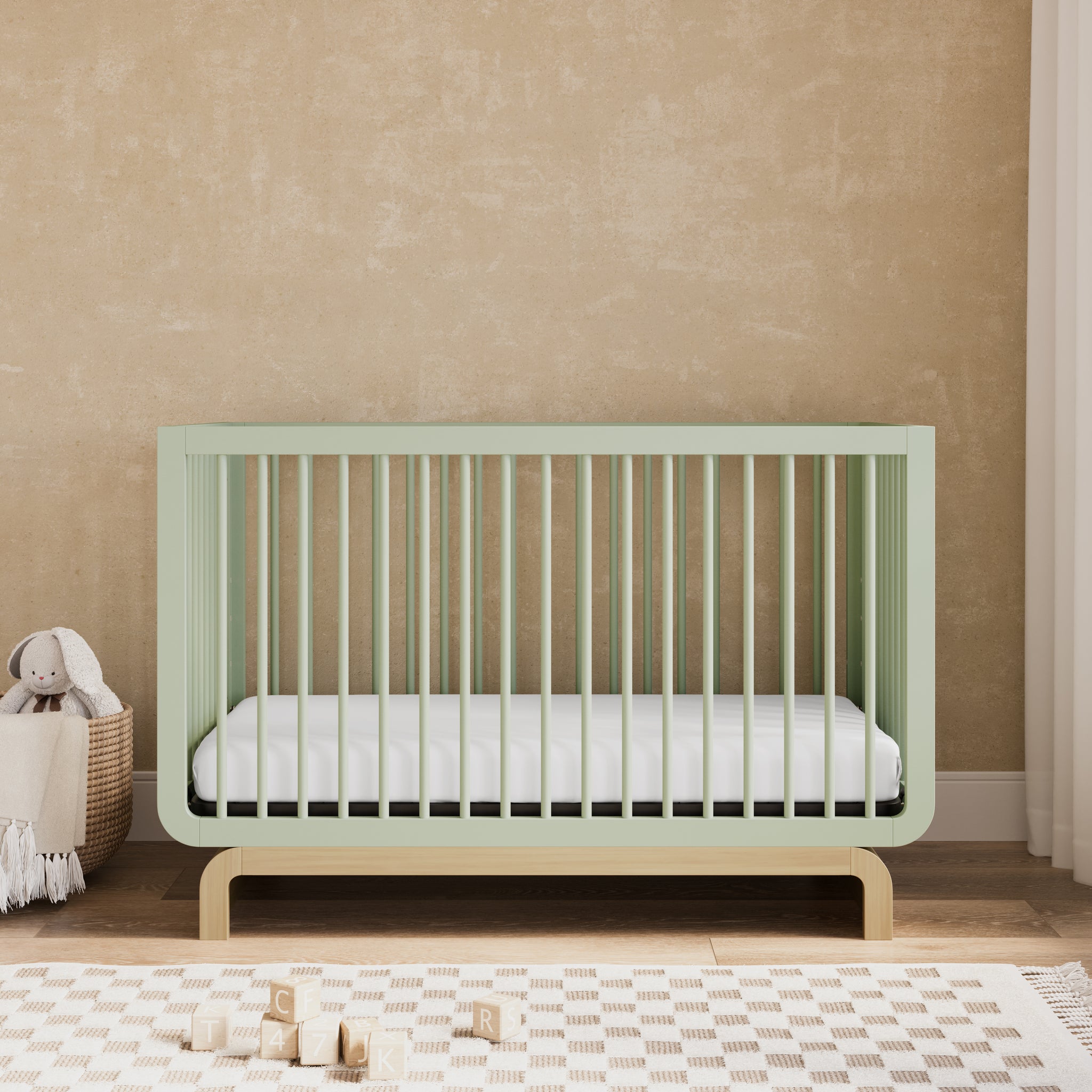 Convertible crib in sage with driftwood colorway in a nursery (Sage with Driftwood)