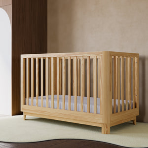 Santos 3-in-1 Convertible Crib in a bedoom 