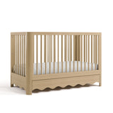 crib with drawer driftwood angled view