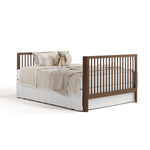 crib hazelnut in full-size bed with headboard and footboard conversion