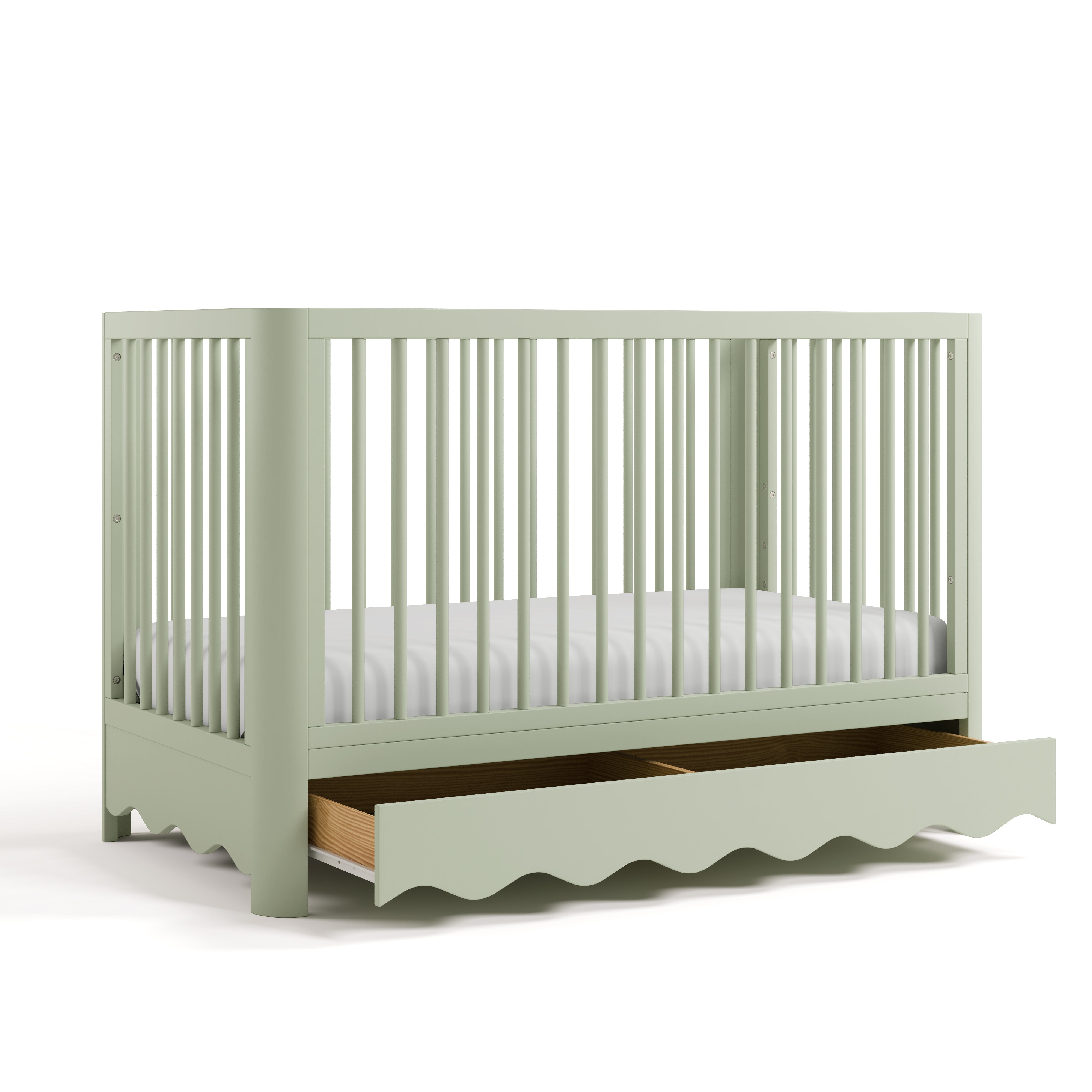 crib with drawer open sage angled view