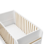 Graco® Read-with-Me™ 4-in-1 Convertible Bookshelf Crib with Drawer.