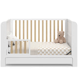 Graco® Read-with-Me™ 4-in-1 Convertible Bookshelf Crib with Drawer.