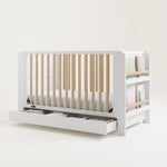 Graco® Read-with-Me™ 4-in-1 Convertible Bookshelf Crib with Drawer.