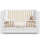 Graco® Read-with-Me™ 4-in-1 Convertible Bookshelf Crib with Drawer.