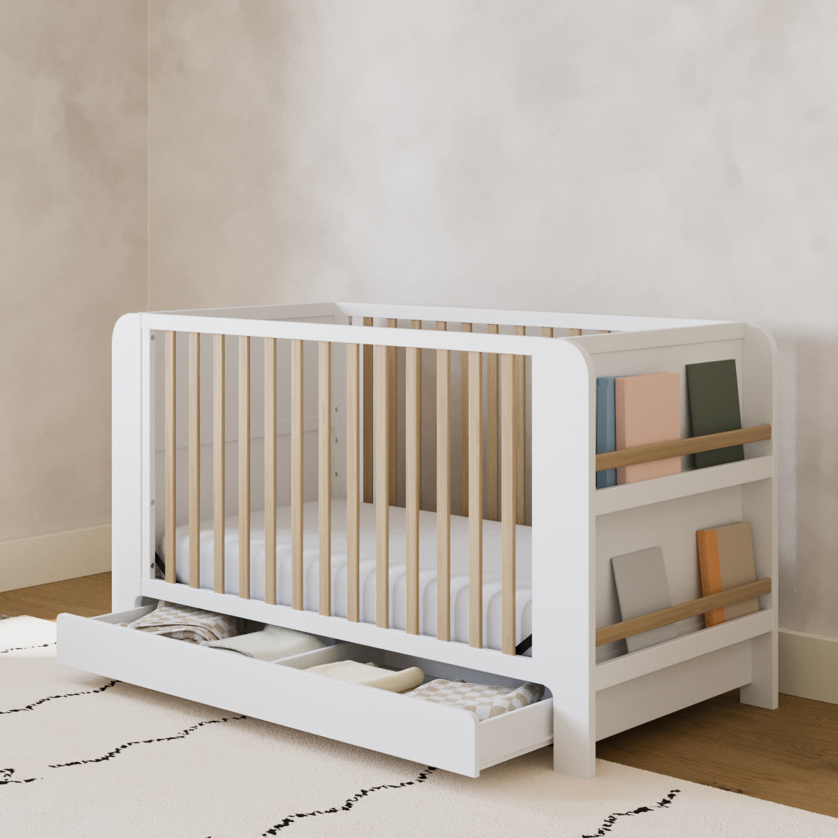 Crib in nursery with open drawer (White with Driftwood)