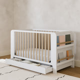 Graco® Read-with-Me™ 4-in-1 Convertible Bookshelf Crib with Drawer.