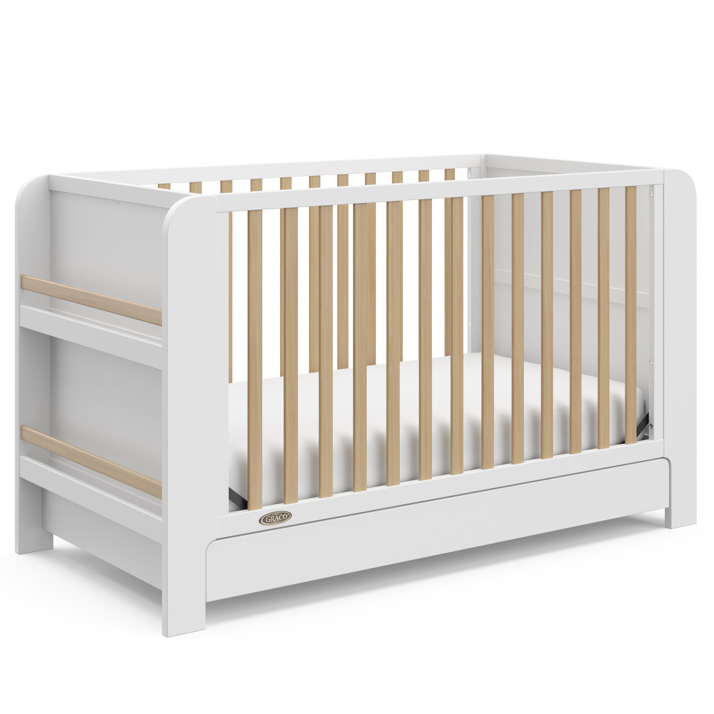 Graco® Read-with-Me™ 4-in-1 Convertible Bookshelf Crib with Drawer.