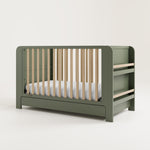 Graco® Read-with-Me™ 4-in-1 Convertible Bookshelf Crib with Drawer.