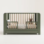 Graco® Read-with-Me™ 4-in-1 Convertible Bookshelf Crib with Drawer.