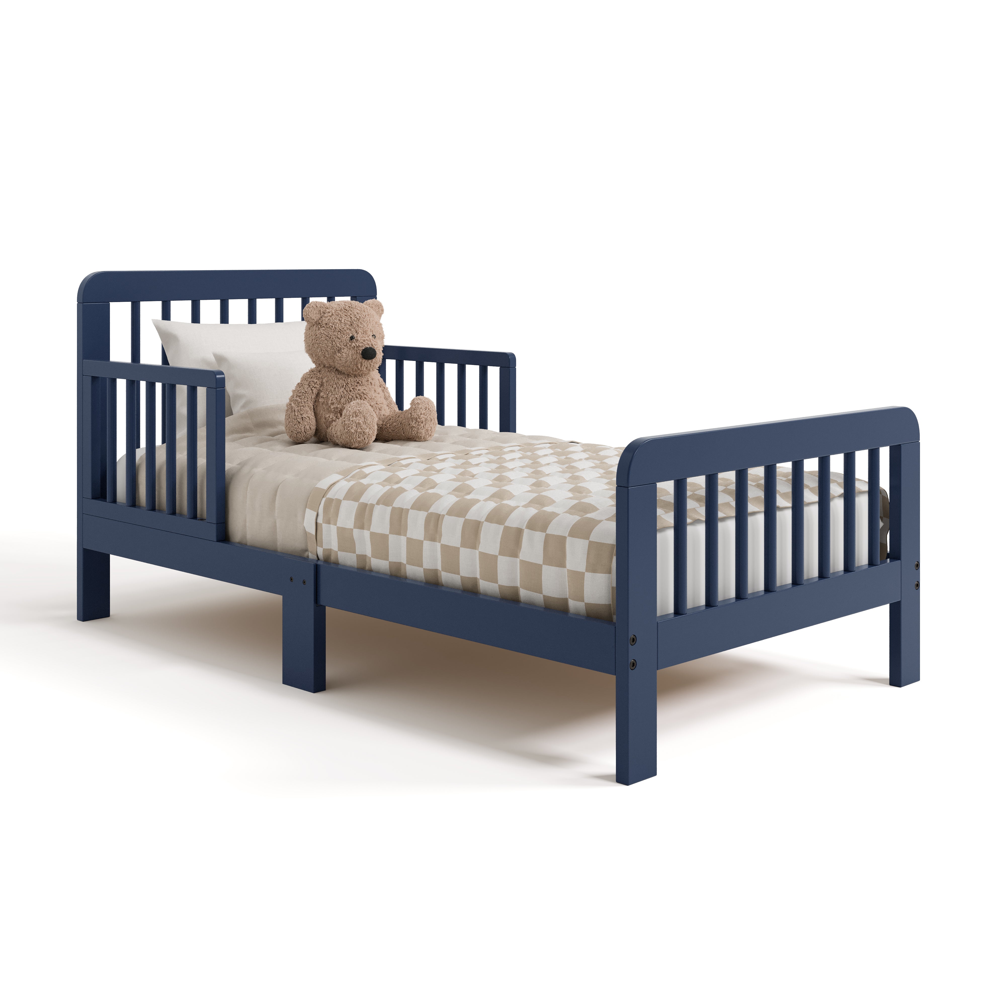 Pasadena midnight blue toddler bed with bedding and teddy bear angle view