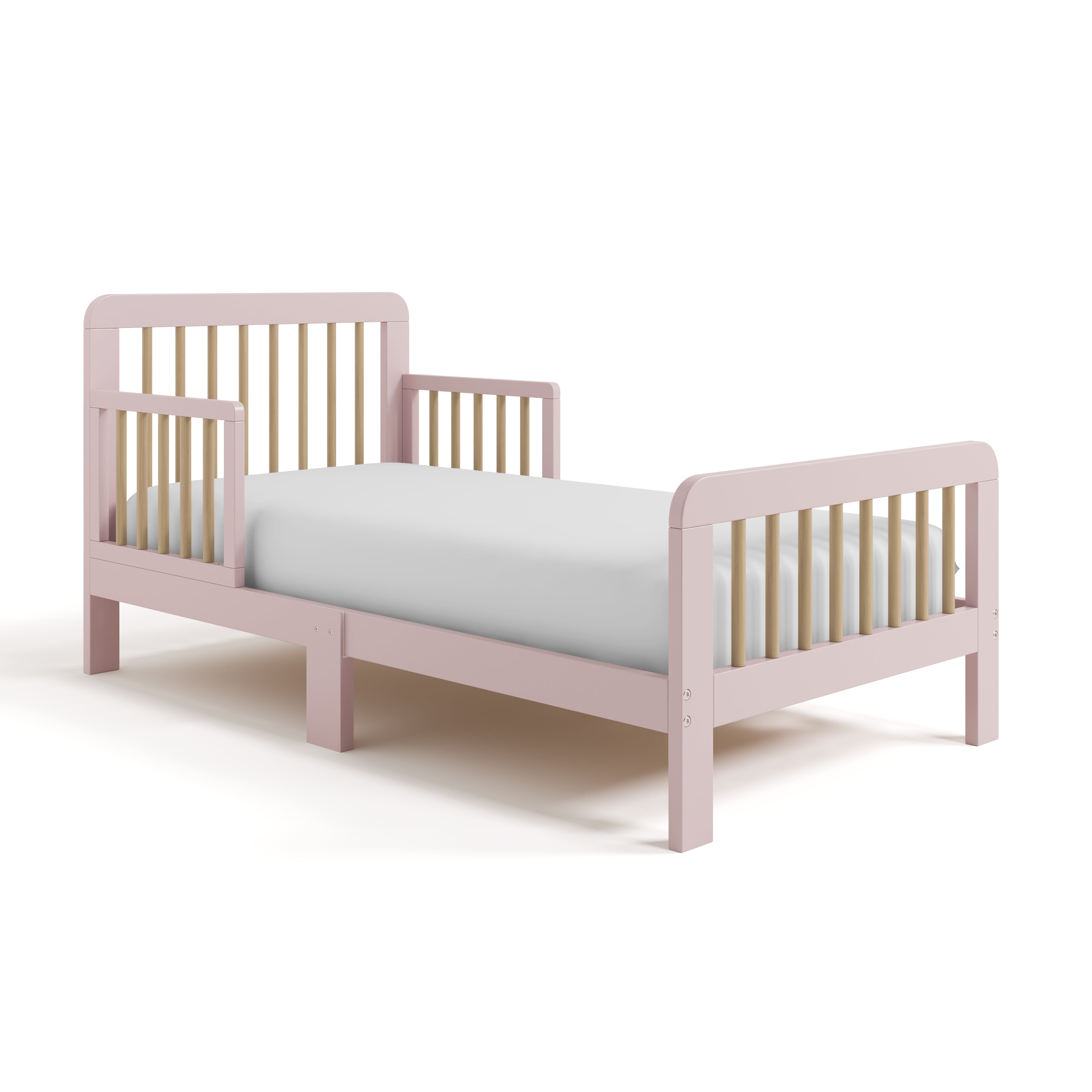 Pasadena blush with driftwood toddler bed angle view