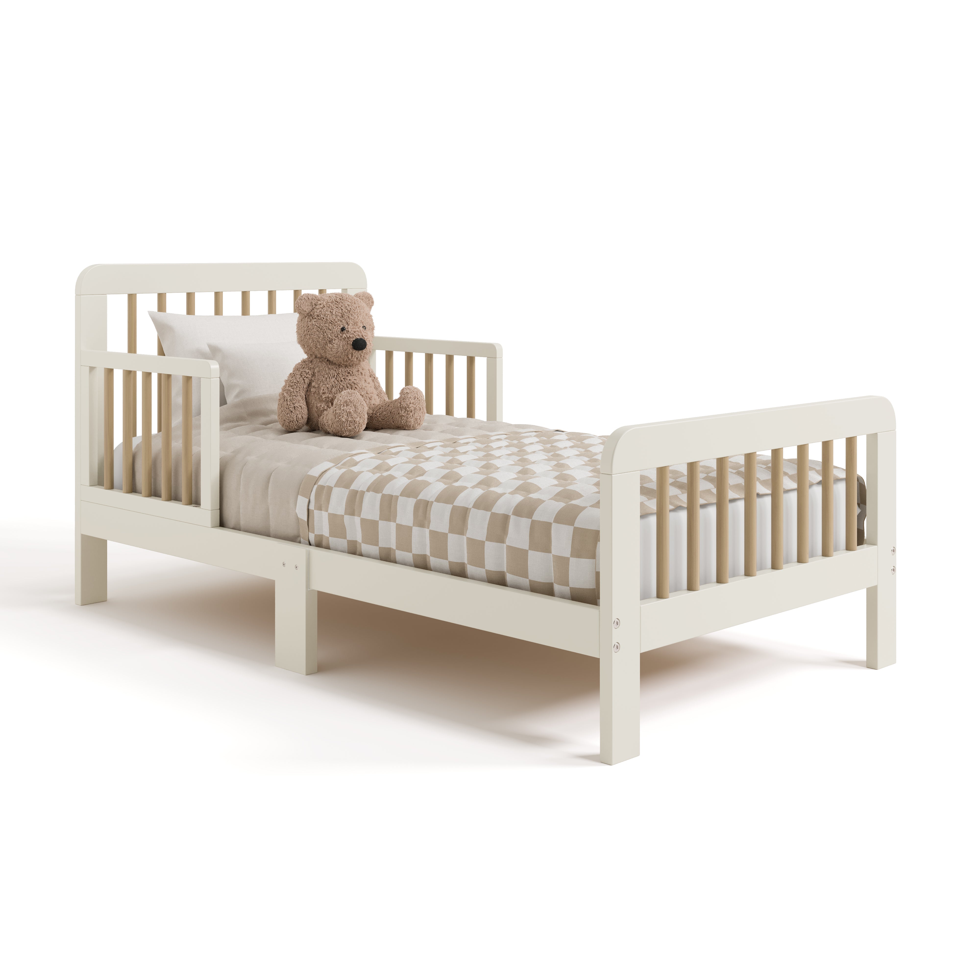 Pasadena frosted oat with driftwood toddler bed with bedding and teddy bear angle view