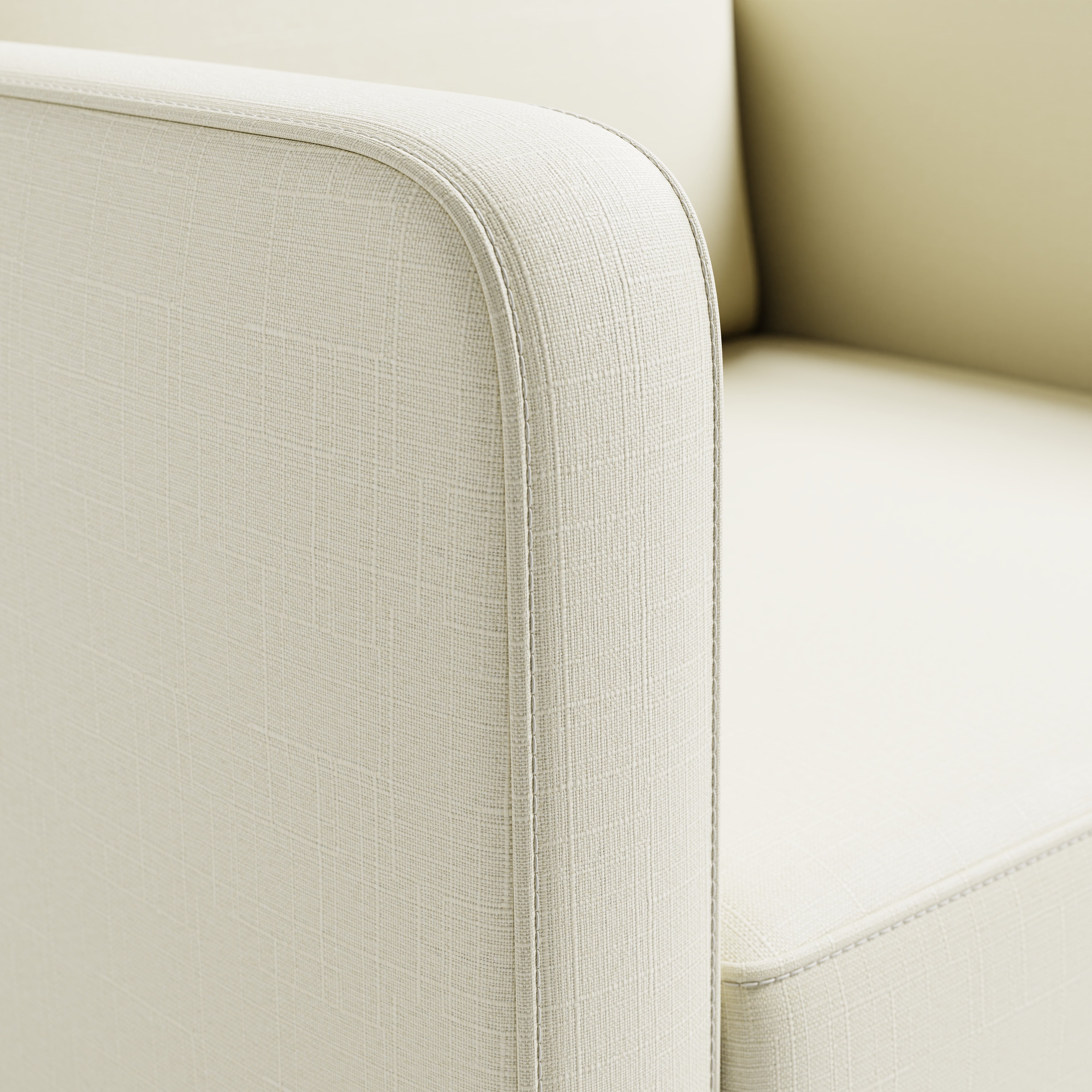 Close-up view of swivel glider with pearl fabric