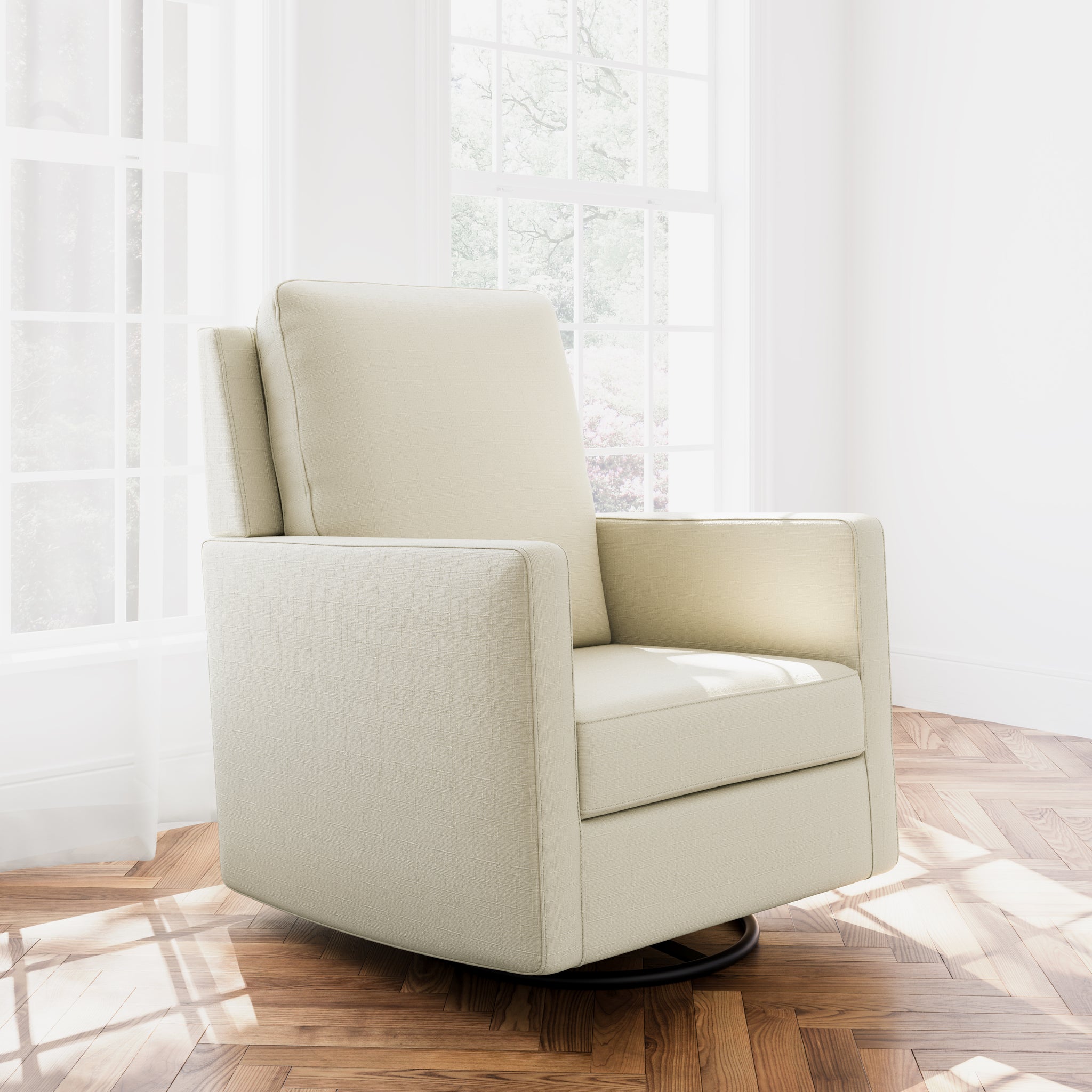 Swivel glider with pearl fabric in a room