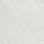 Graco® Oval Contoured Changing Pad with Bonus Cover and Water-Resistant Liner.