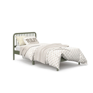 angled view of OLIVE twin bed with bedding