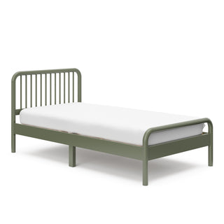 angled view of olive twin bed