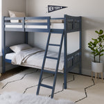  navy bunk bed with fixed ladder angled with bedding in a nursery