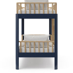 Side view of natural wood and blue bunk bed 