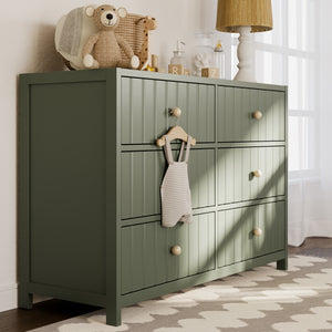 Olive dresser in nursery setting